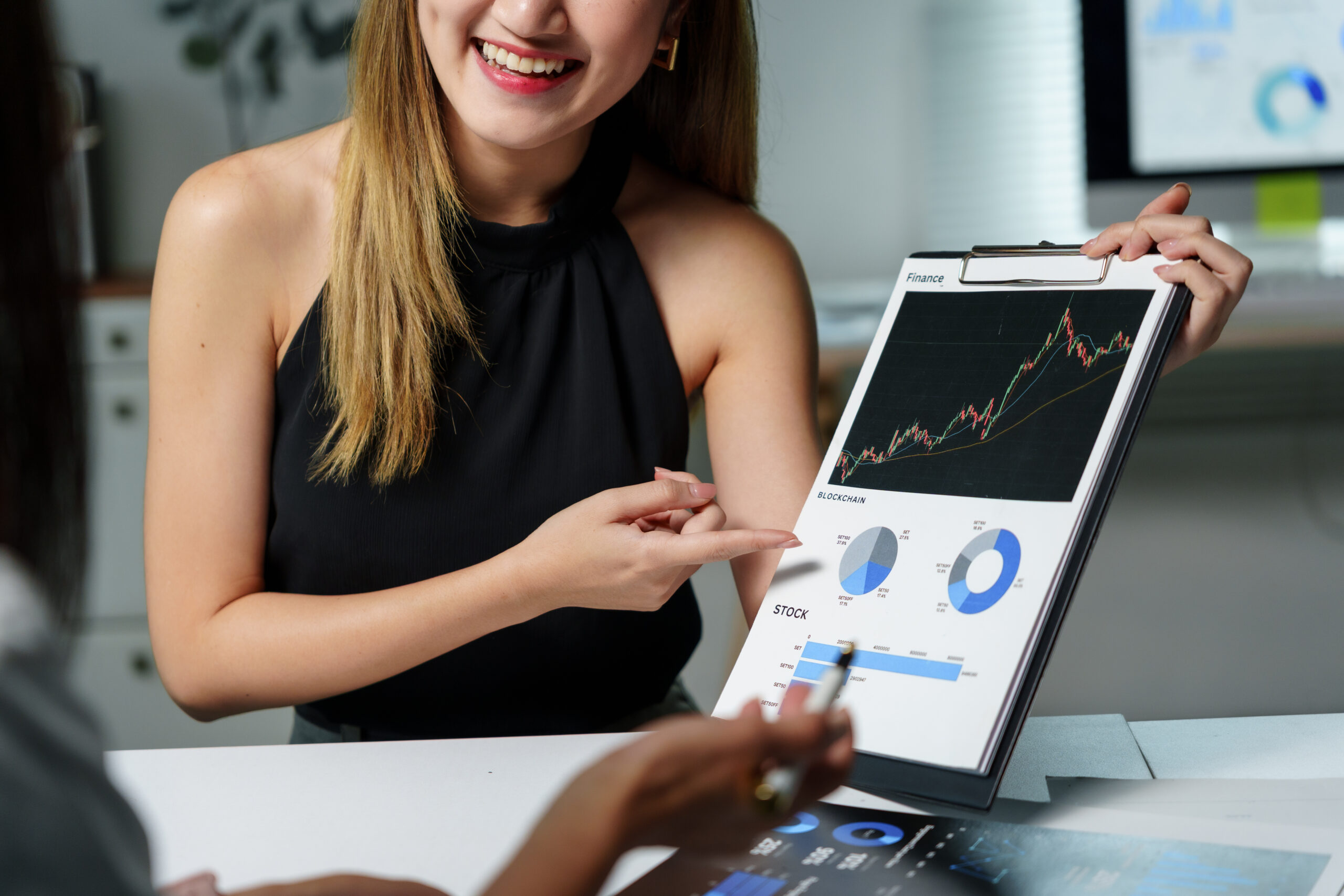 financial advisor showing positive financial chart 2025 09 28 05 13 06 utc 1 scaled High-Frequency Trading for Forex: Why Your VPS Can Make or Break You