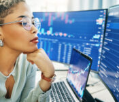 afforadable-managed-vps-woman-looking-into-laptop