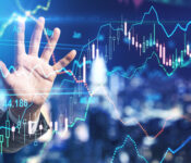 Stock market investment concept with businessman hand touching digital screen with forex chart indicators