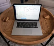 Close-up-of-a-laptop-displaying-trading-charts-for-financial-market-analysis