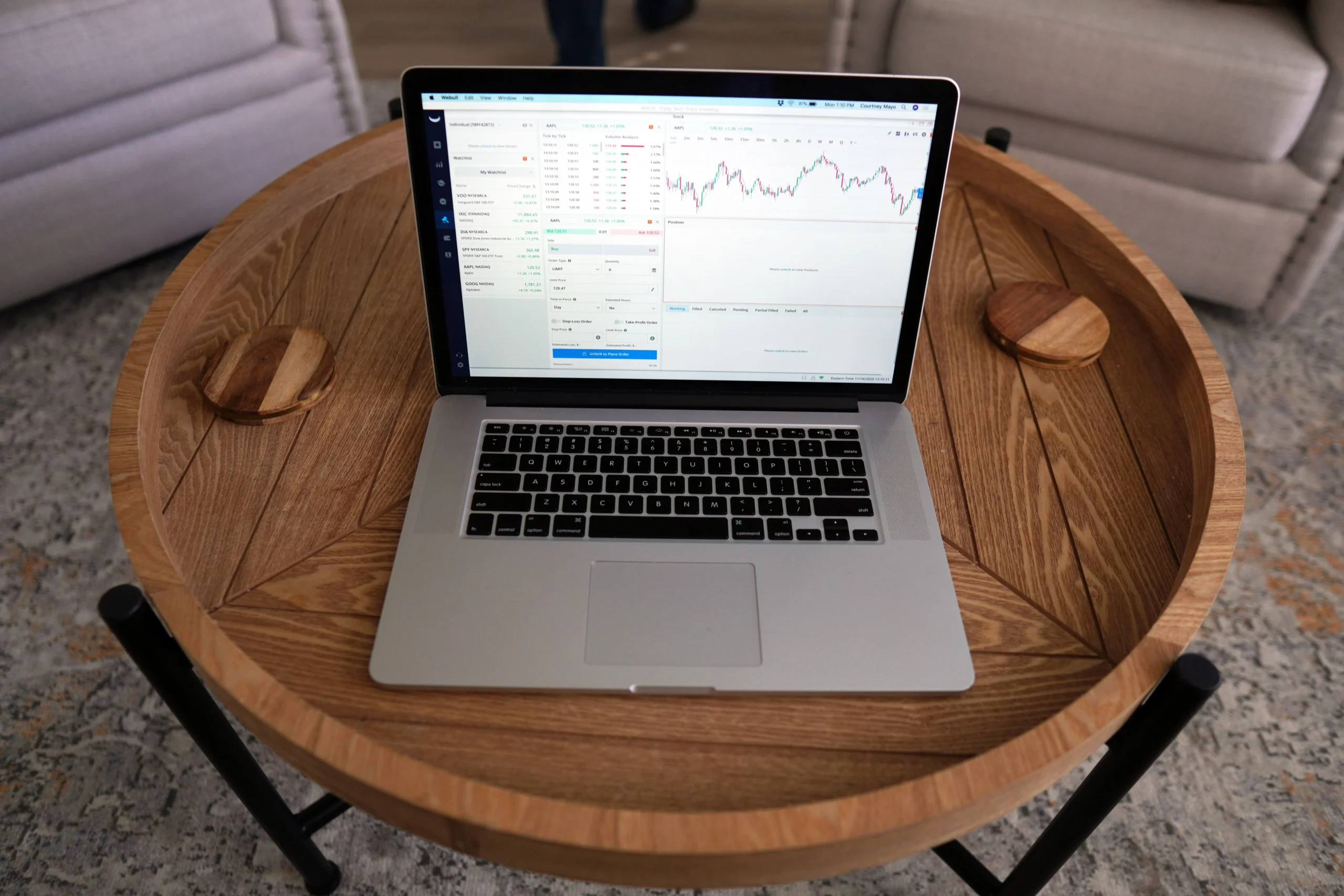 Close-up-of-a-laptop-displaying-trading-charts-for-financial-market-analysis