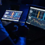 man-analyzing-financial-charts-for-forex-trading