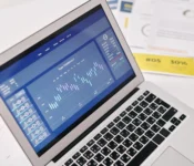 pen-laptop-displaying-financial-graphs-and-analytics-for-forex-trading