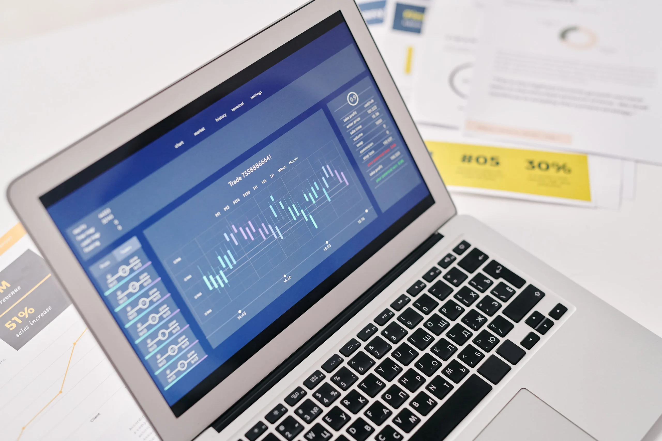 pen-laptop-displaying-financial-graphs-and-analytics-for-forex-trading